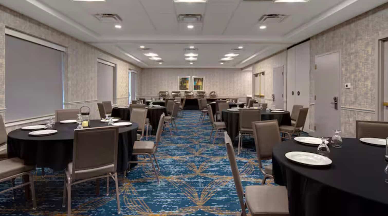 Long room with tables and chairs